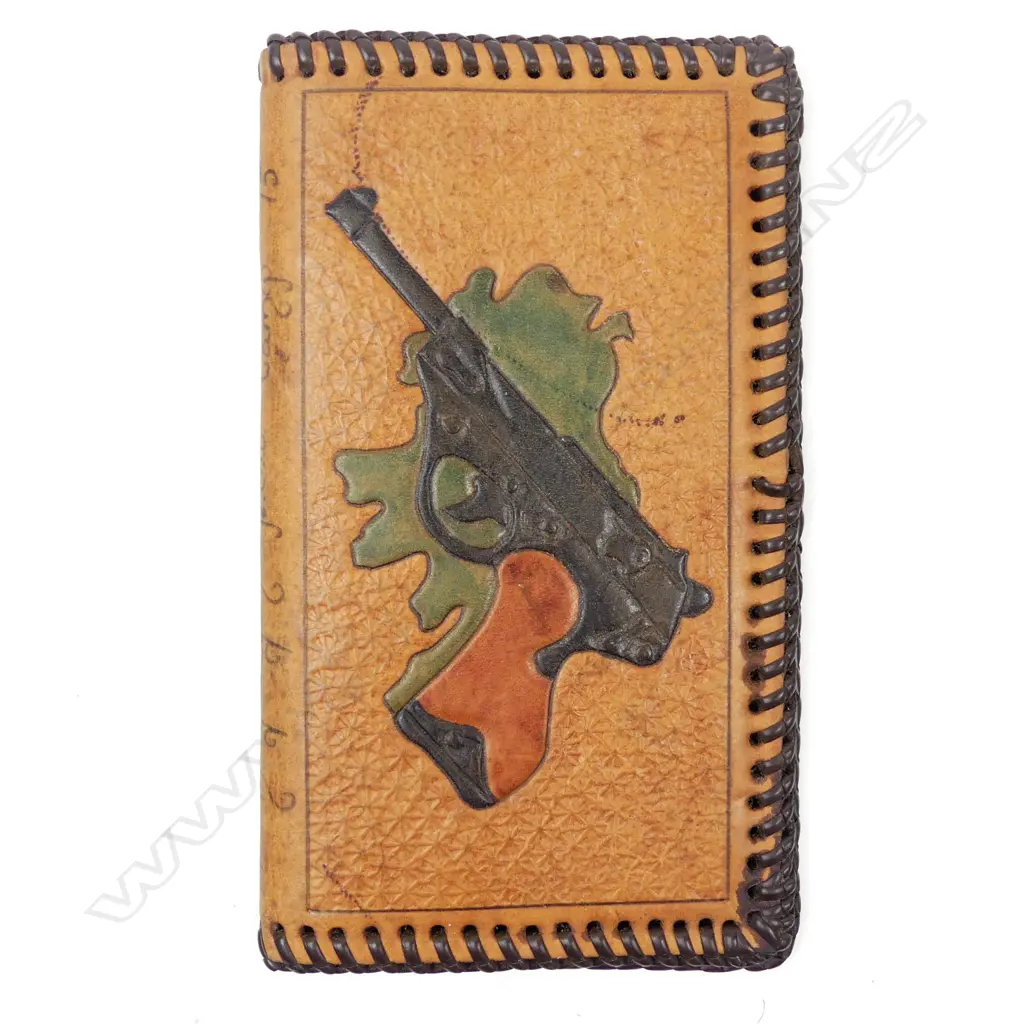 An Irish tooled leather wallet inscribed Magilligan P.O.W. Camp 1975 Image 1++