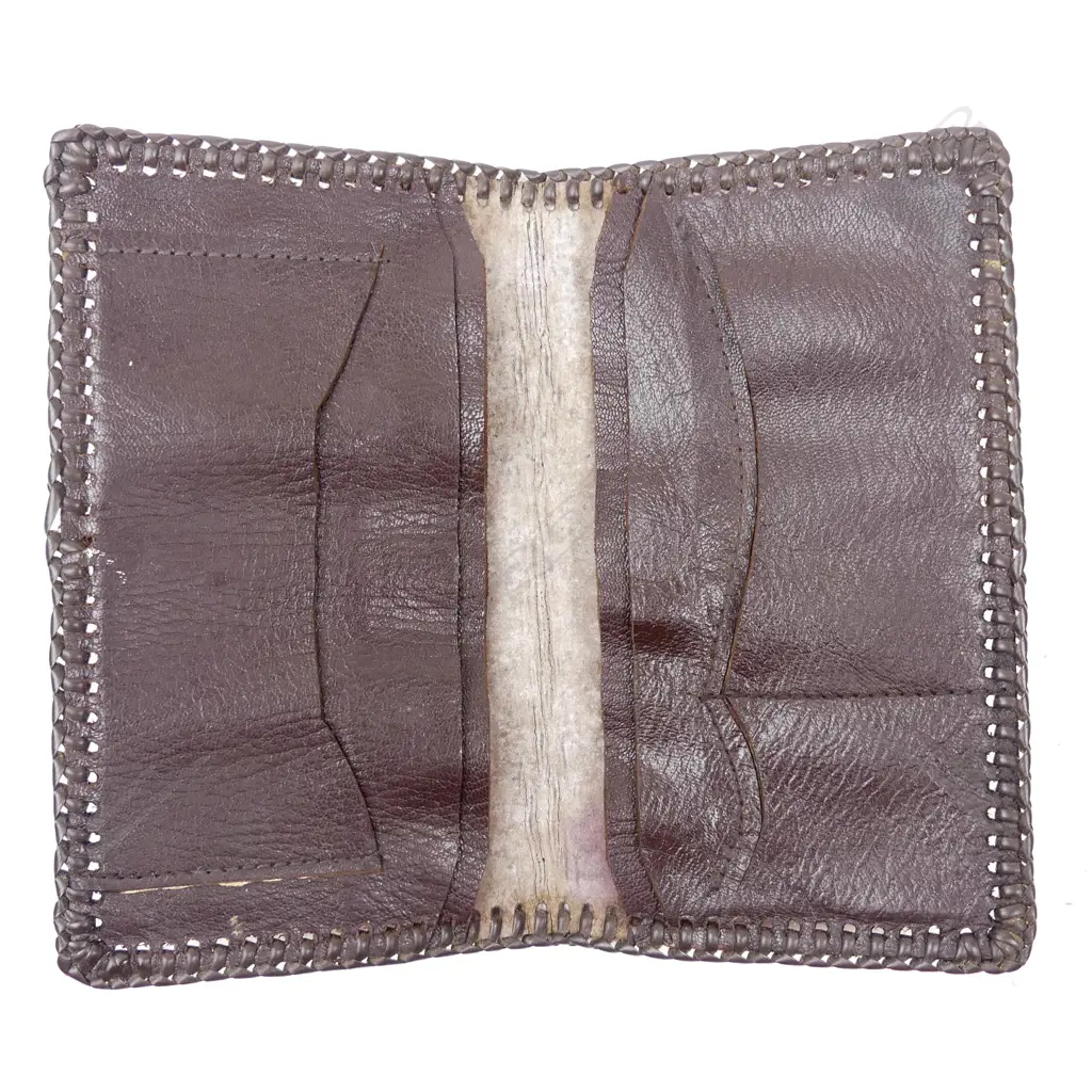 An Irish tooled leather wallet inscribed Magilligan P.O.W. Camp 1975 Image 1++