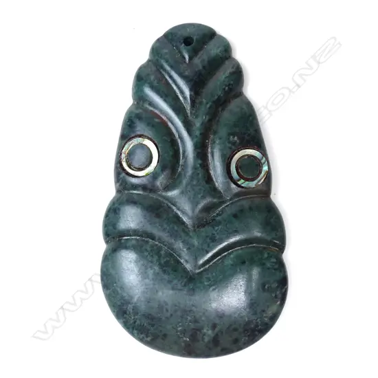 A Mike Higgs carved stylised Maori pendant