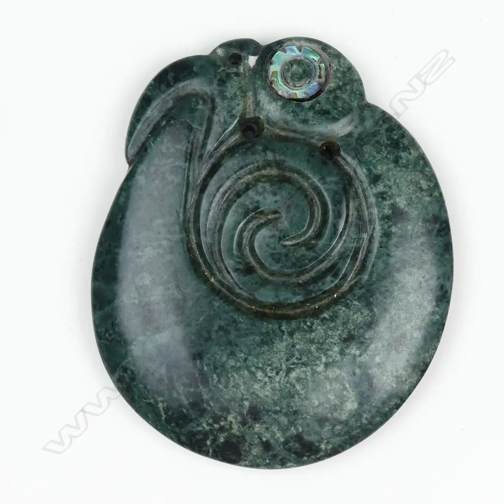 A Mike Higgs carved stylised Maori pendant Image 1++