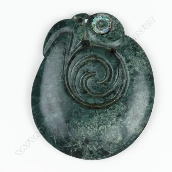 A Mike Higgs carved stylised Maori pendant