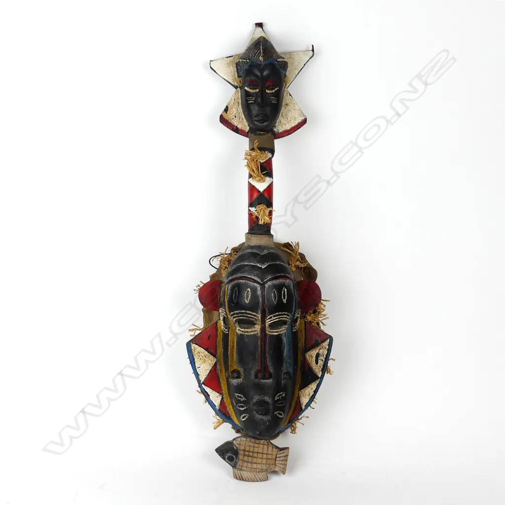 An African carved wood mask Image 1++