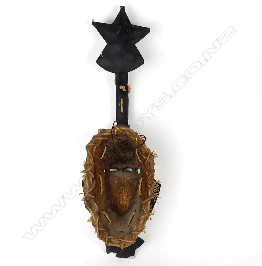 An African carved wood mask Image 1++