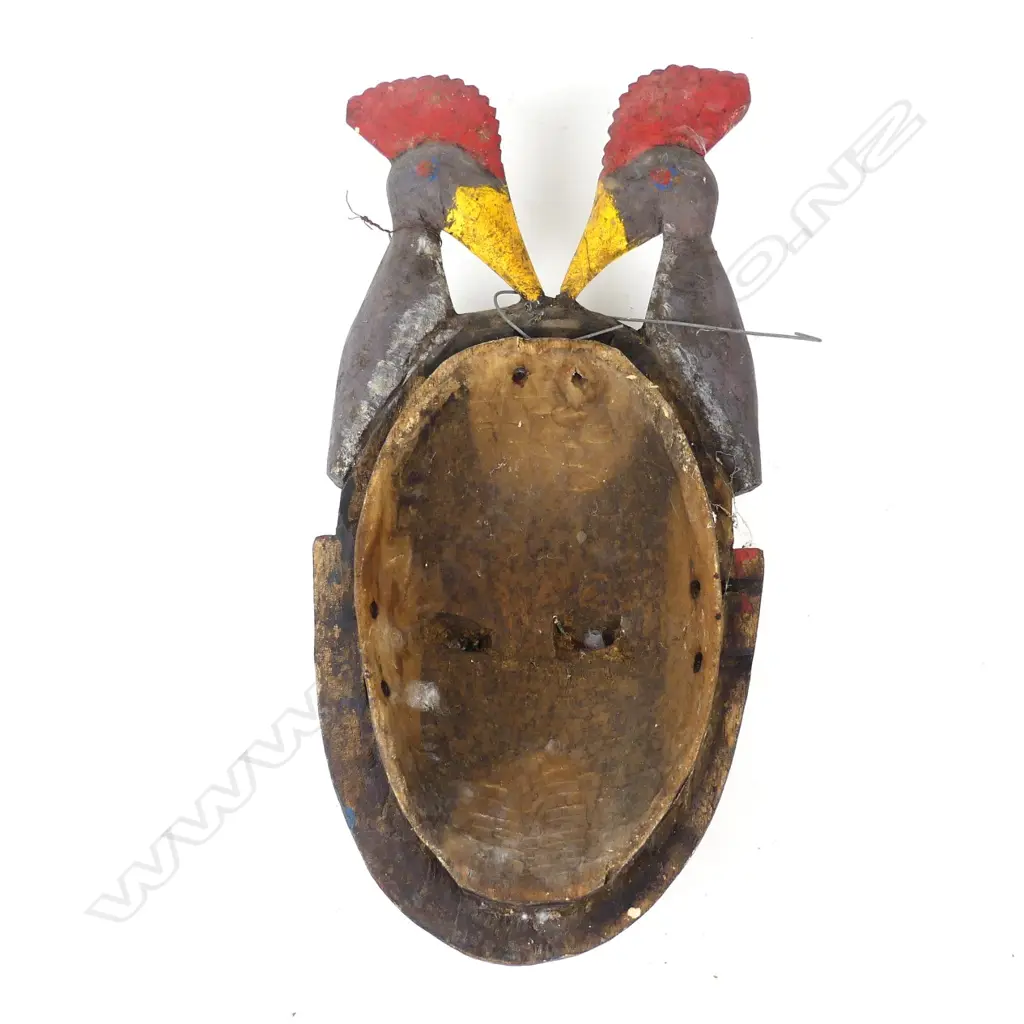 An African carved wood mask Image 1++