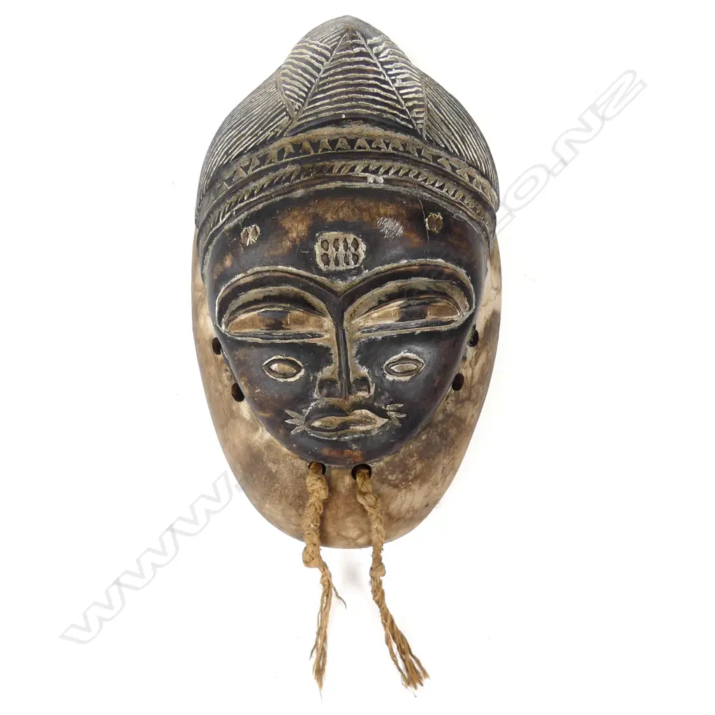An African Punu-Lumbo (Gabon) mask for the okyui dance ceremony Image 1++