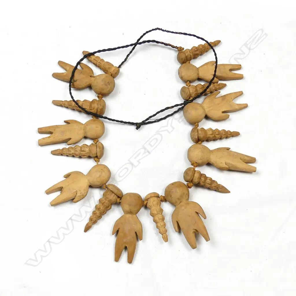 A Tongan carved wood necklace Image 1++