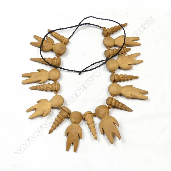 A Tongan carved wood necklace