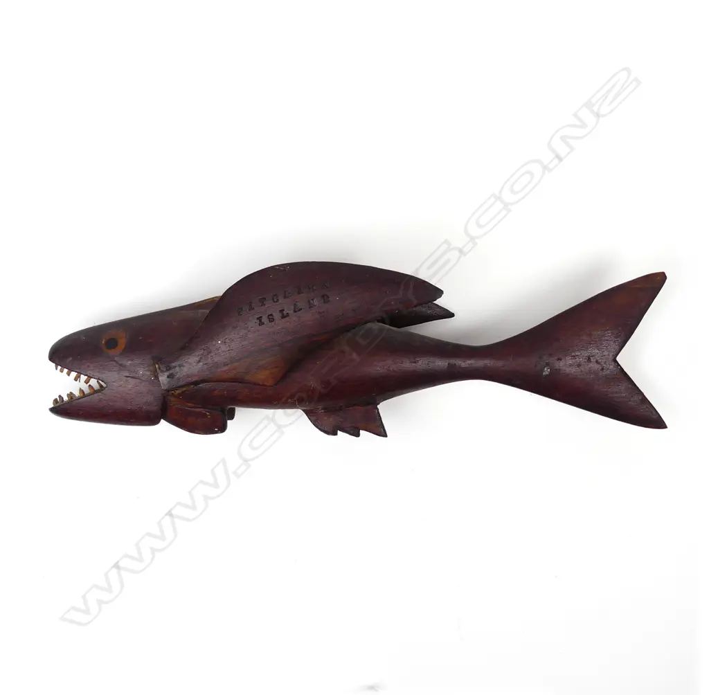 An old Pitcairn Island carved flying fish Image 1++