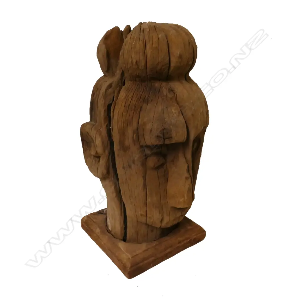 An old and weathered Indonesian hardwood bust Image 1++