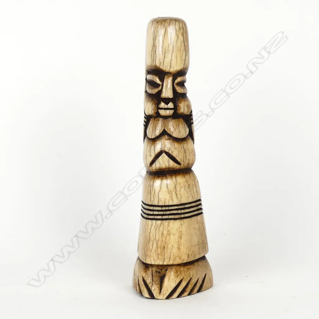 A carved bone shamanistic figure Image 1++
