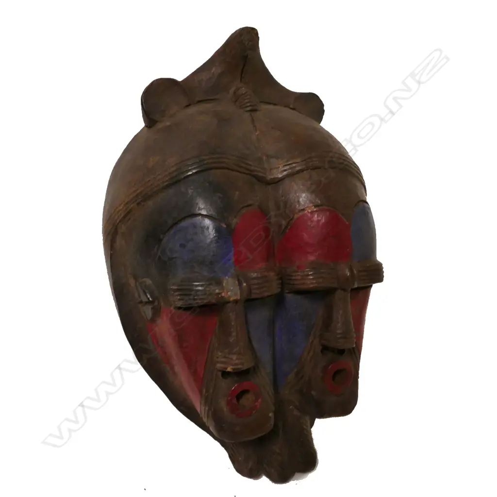 An African sculpted ceramic double mask Image 1++