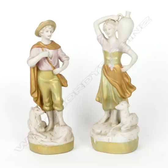 A pair of early 20thC Royal Dux figures