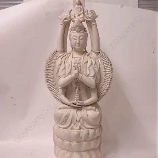 A large blanc-de-chine Kuanyin figure