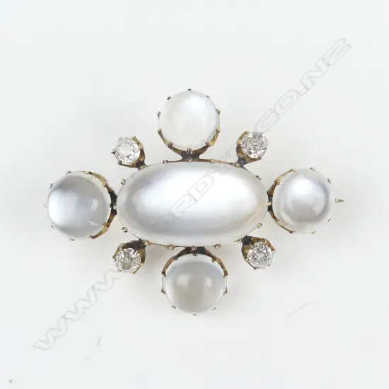 An Edwardian gold moonstone and diamond brooch