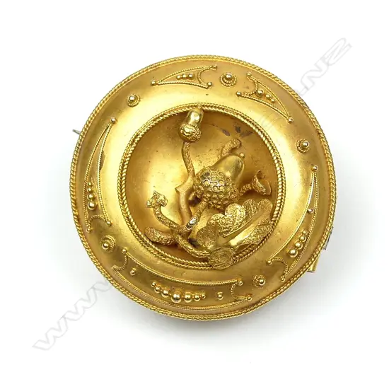 A Victorian gold mourning brooch