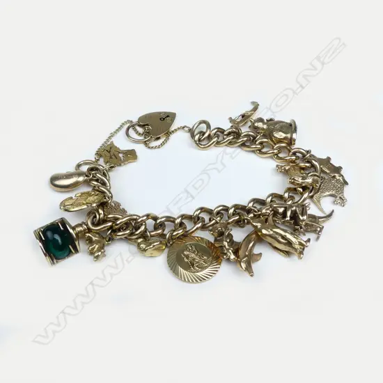 A 9ct gold curb link charm bracelet