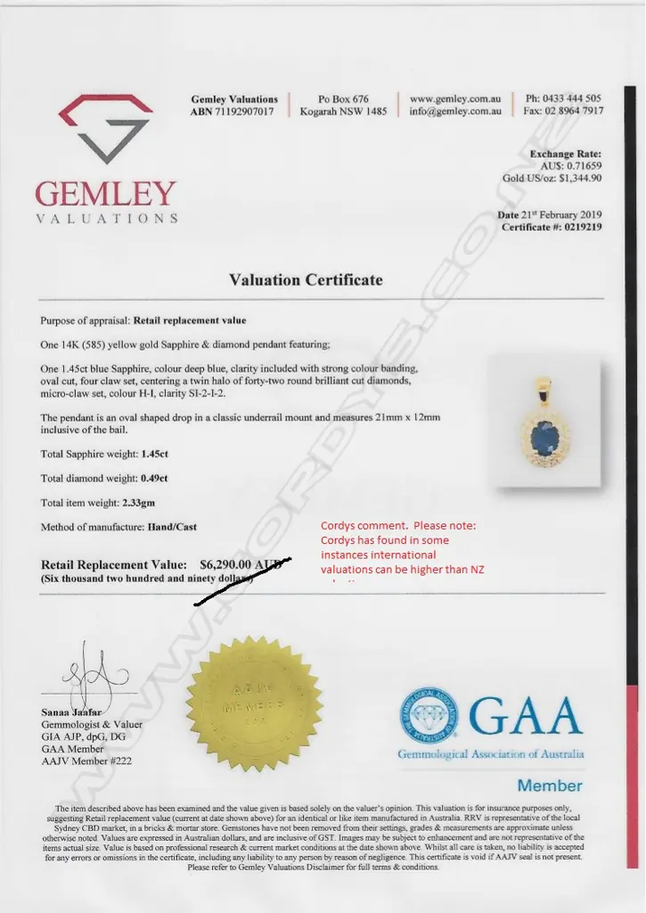 A 14ct gold sapphire and diamond pendant Image 1++