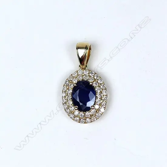 A 14ct gold sapphire and diamond pendant
