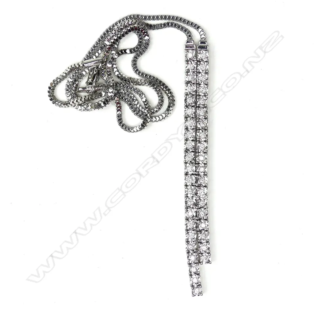 A 14ct white gold and diamond necklace Image 1++