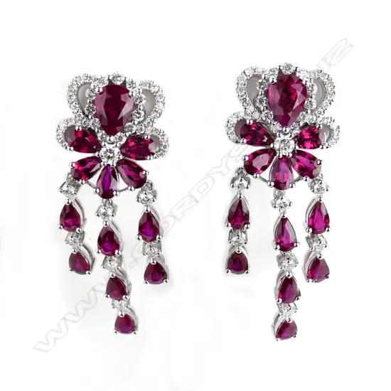 A pair of 18ct. white gold ruby and diamond chandelier type earrings