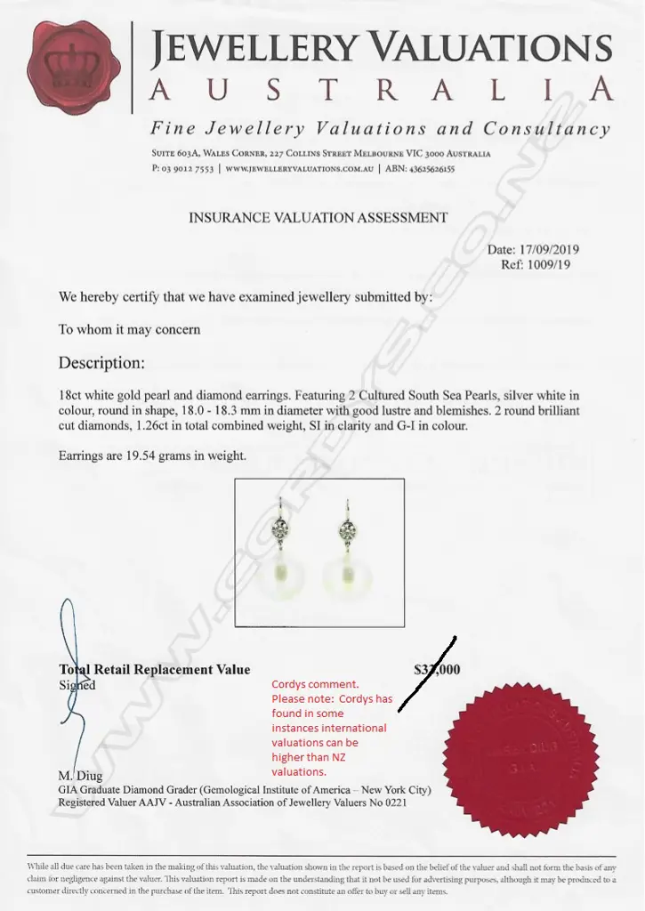 A pair of 14ct white gold pearl and diamond drop earrings Image 1++