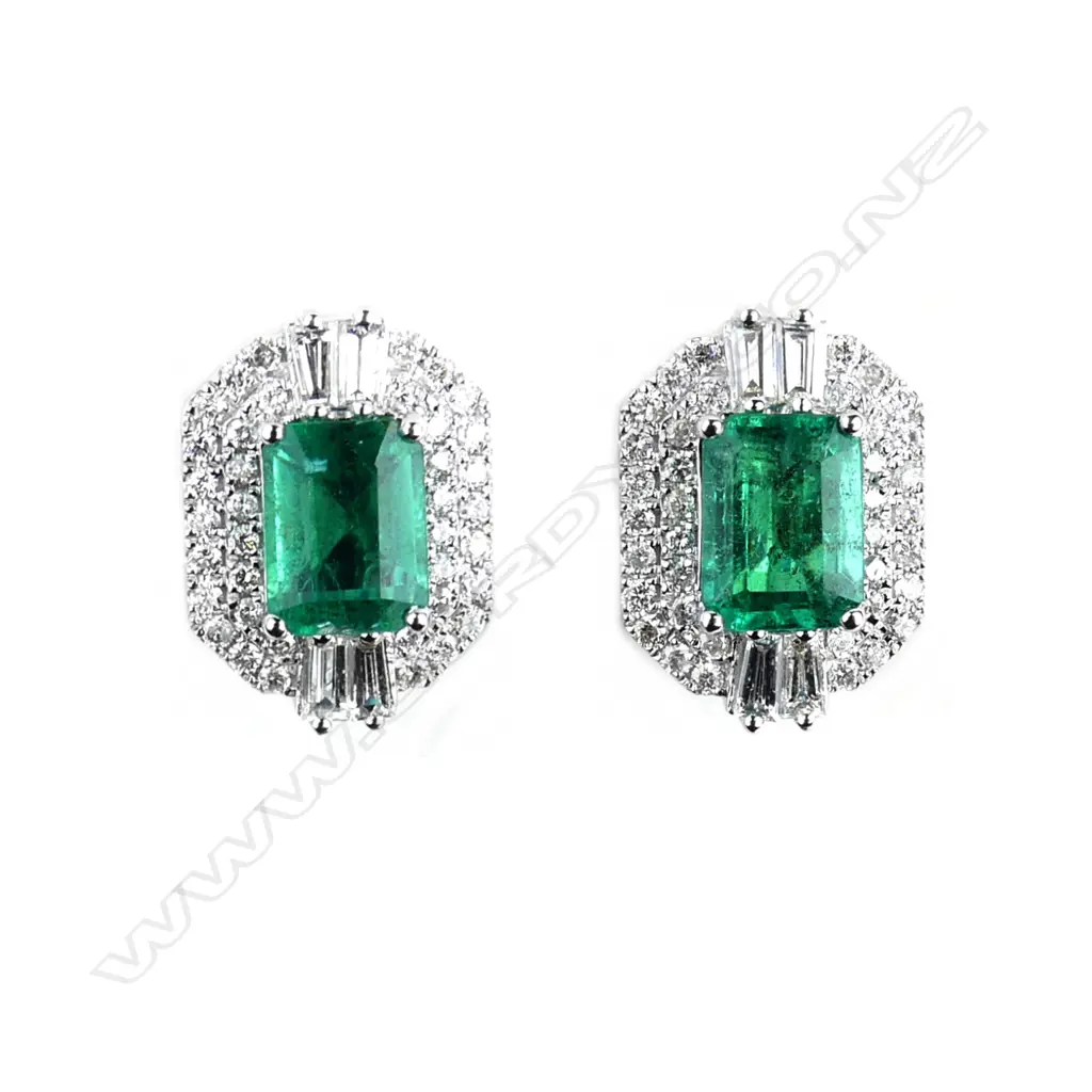 A pair of impressive 18ct white gold emerald and diamond earrings Image 1++