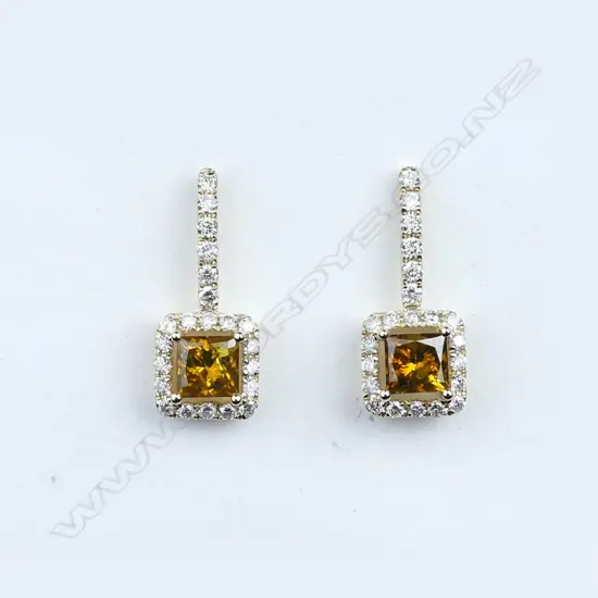 A pair of 14ct gold and diamond earrings