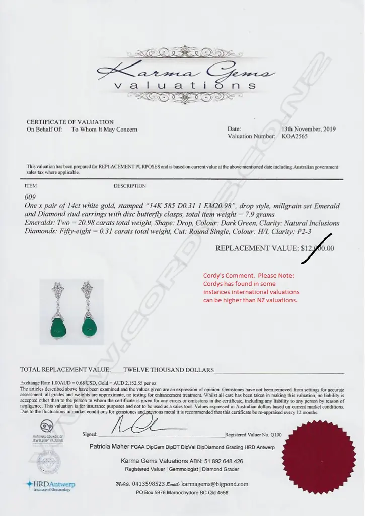 A pair of 14ct white gold emerald and diamond Art Deco style earrings Image 1++