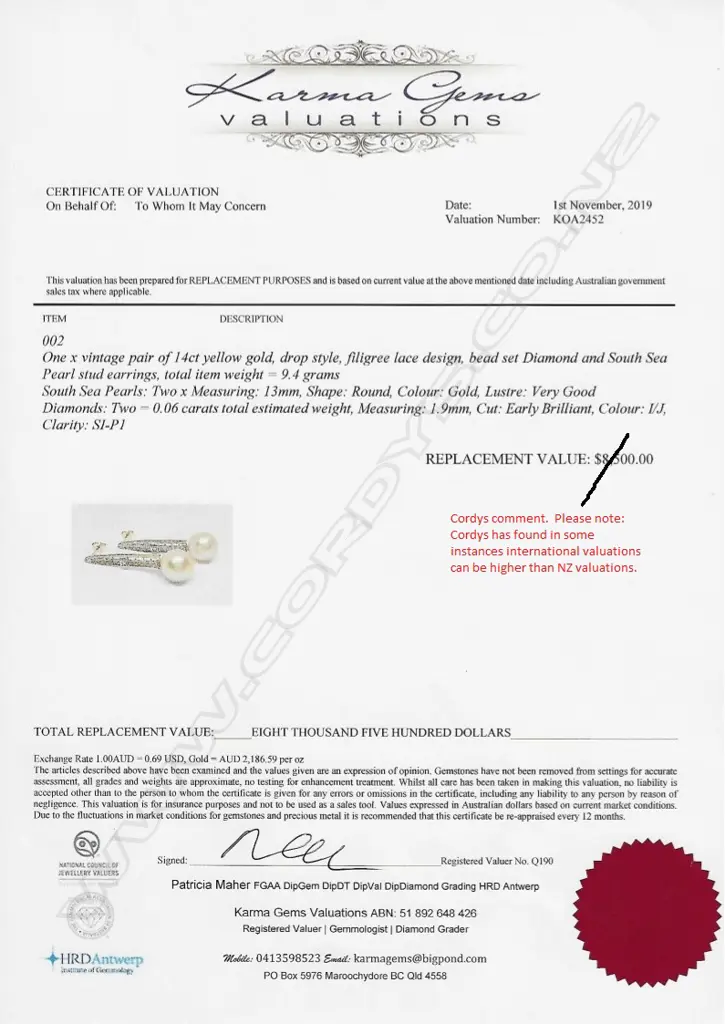 A pair of 14ct gold pearl and diamond drop earrings Image 1++