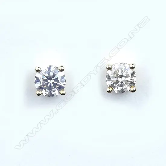A pair of 14ct gold and diamond stud earrings