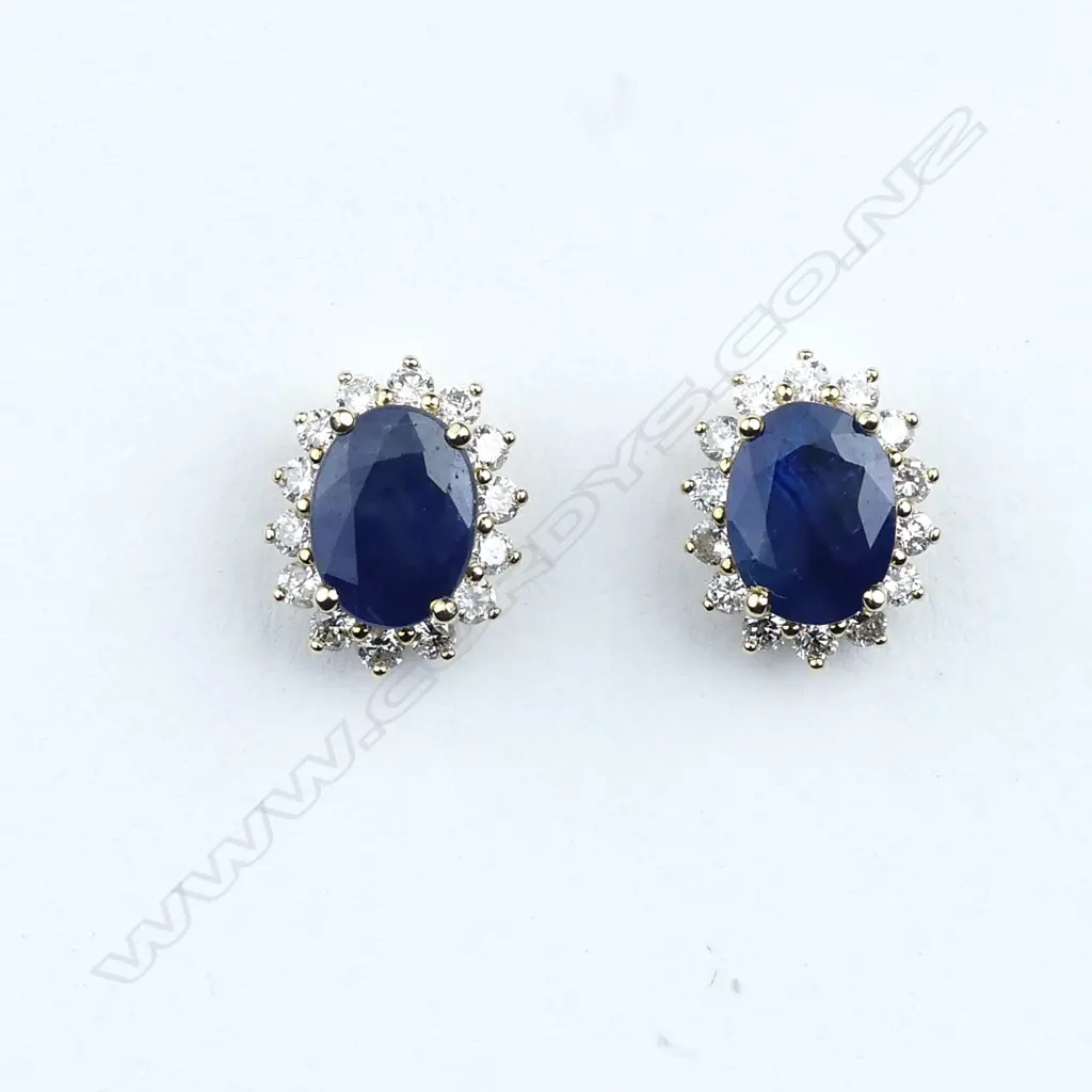 A pair of 14ct gold sapphire and diamond stud earrings Image 1++