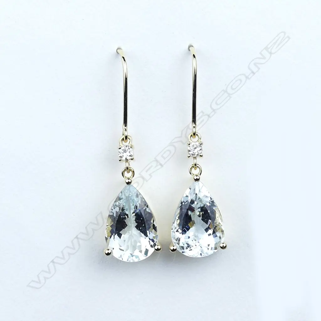 A pair of 14ct gold aquamarine and diamond drop earrings Image 1++