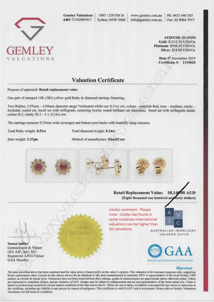 A pair of 14ct gold ruby and diamond stud earrings Image 1++