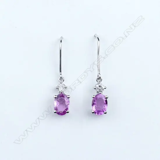 A pair of 14ct white gold sapphire and diamond drop earrings