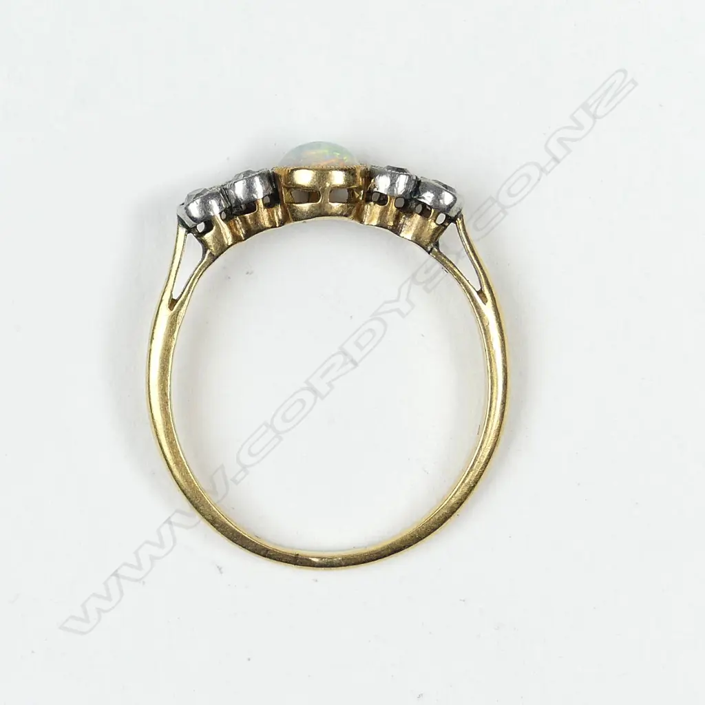 An estate 18ct gold opal and diamond ring Image 1++