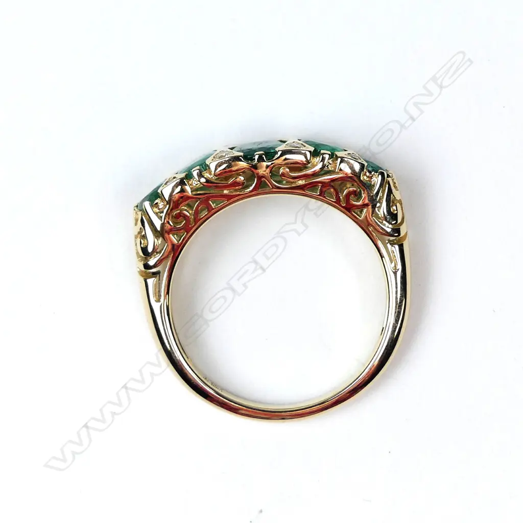 A 14ct gold emerald and diamond ring Image 1++