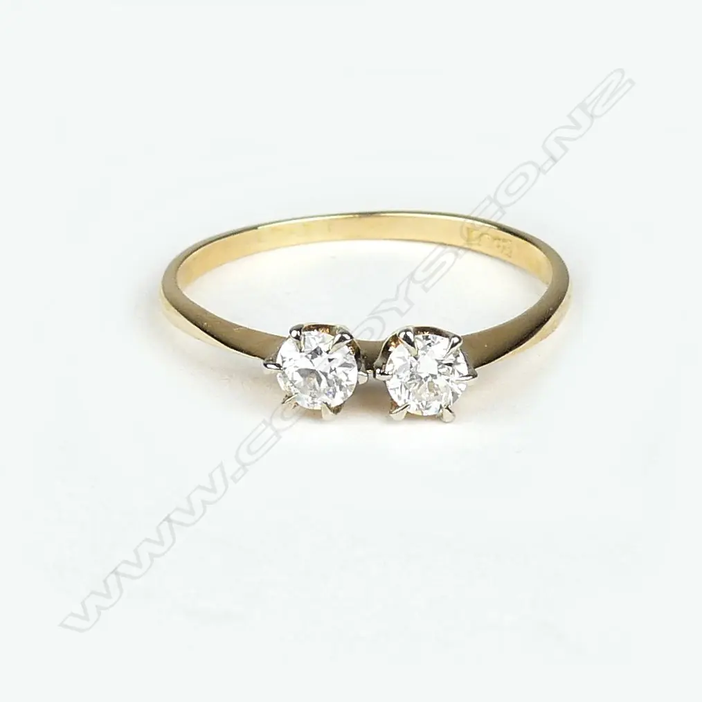 An 18ct gold and two stone diamond ring Image 1++