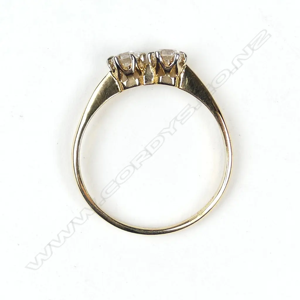 An 18ct gold and two stone diamond ring Image 1++