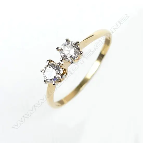 An 18ct gold and two stone diamond ring