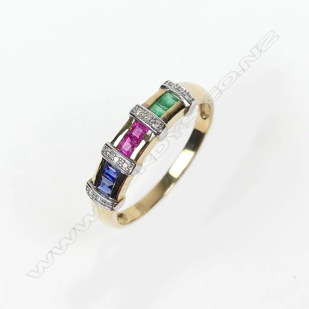 A 9ct gold ruby sapphire emerald and diamond ring Image 1++