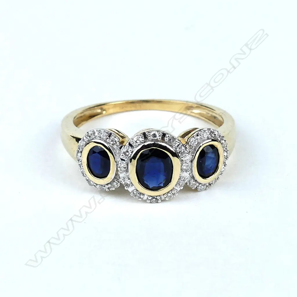 A 9ct gold sapphire and diamond dress ring Image 1++