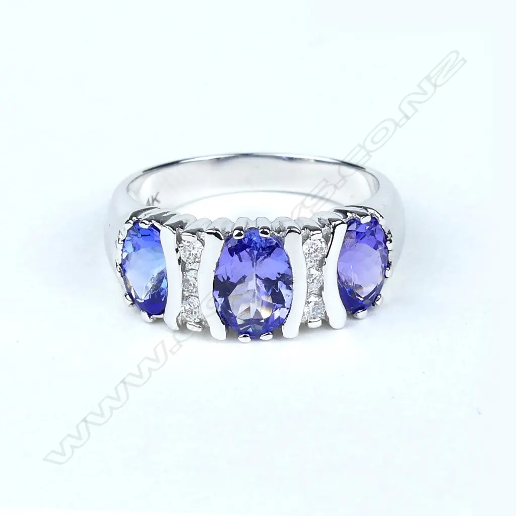 A 14ct white gold tanzanite and diamond ring Image 1++