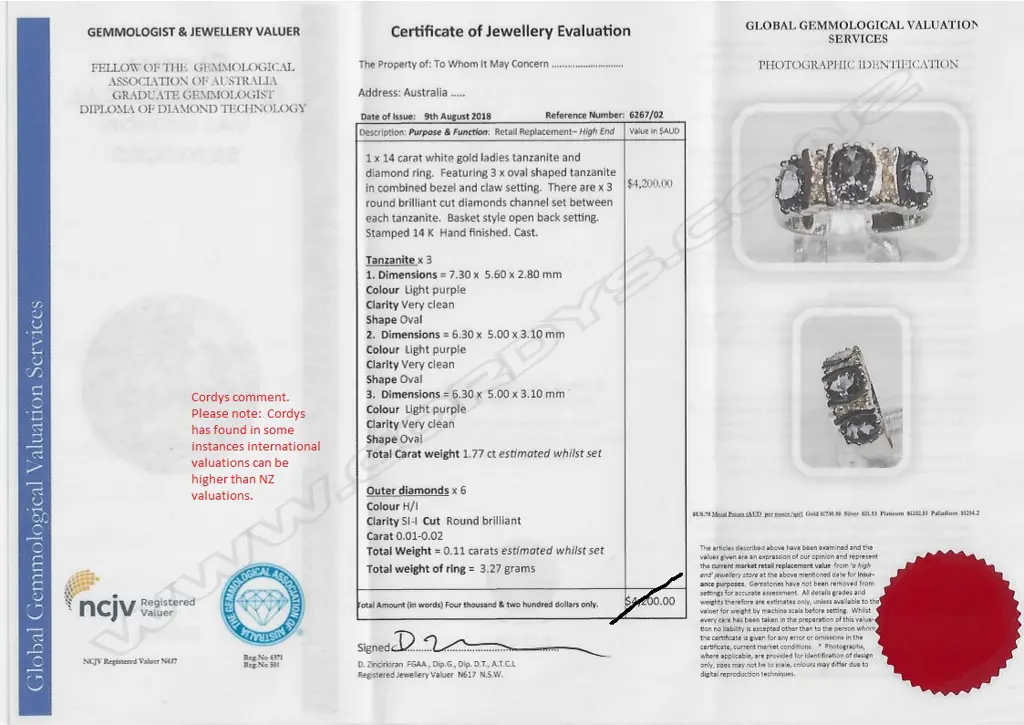 A 14ct white gold tanzanite and diamond ring Image 1++
