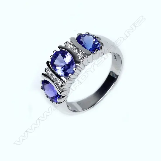 A 14ct white gold tanzanite and diamond ring