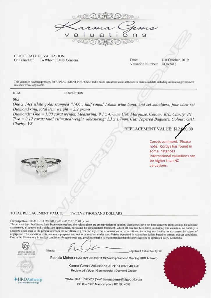 A 14ct white gold and diamond solitaire ring Image 1++