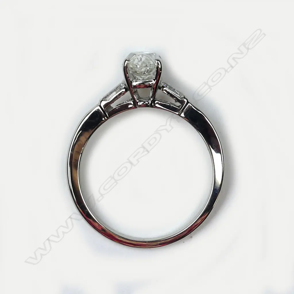 A 14ct white gold and diamond solitaire ring Image 1++