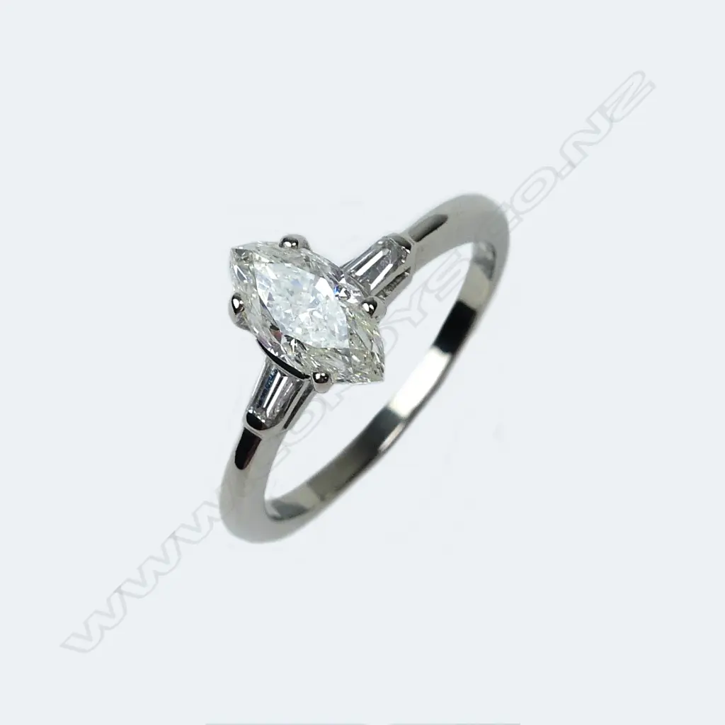 A 14ct white gold and diamond solitaire ring Image 1++