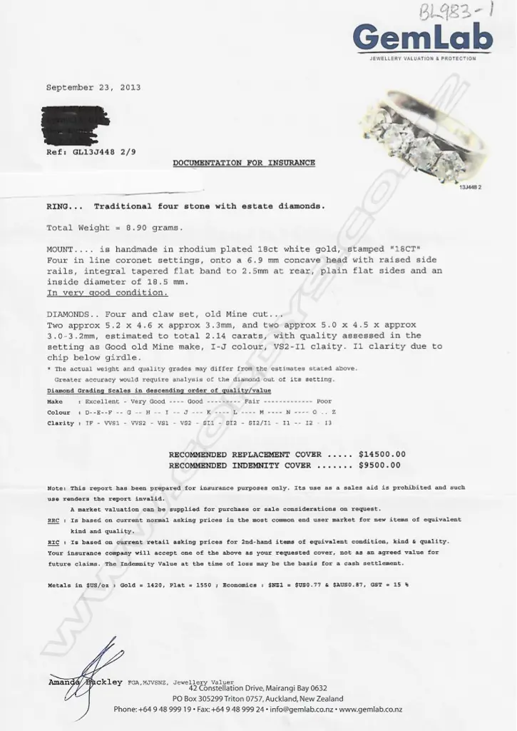 An 18ct white gold and four stone diamond ring Image 1++