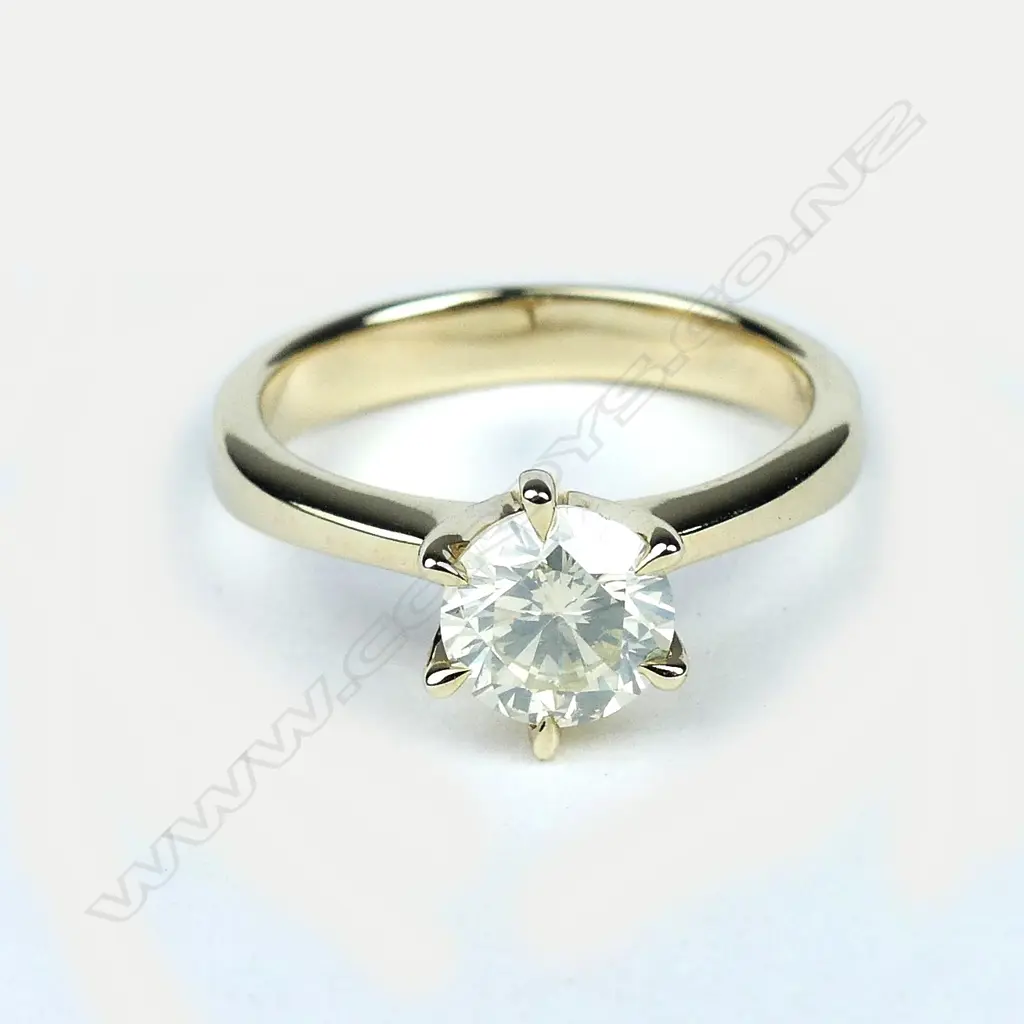 A 14ct gold diamond solitaire ring Image 1++