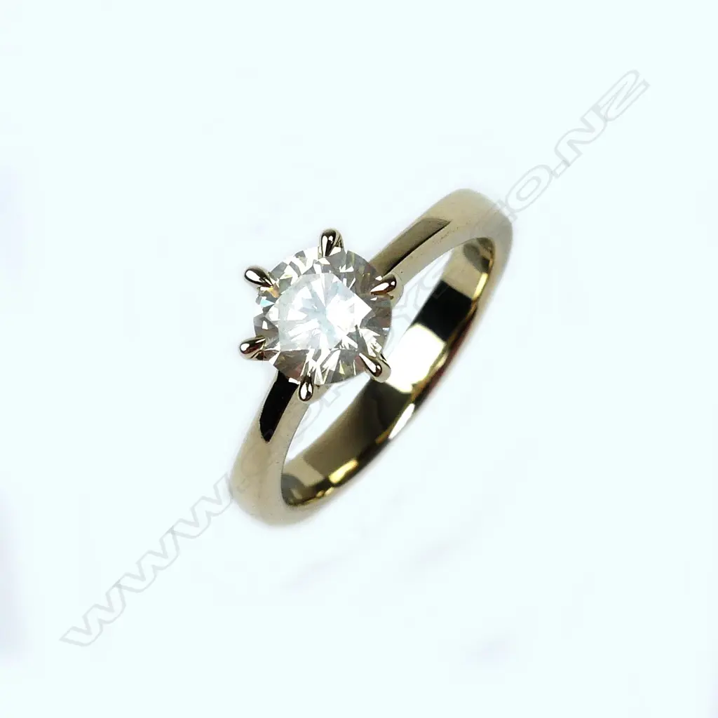 A 14ct gold diamond solitaire ring Image 1++